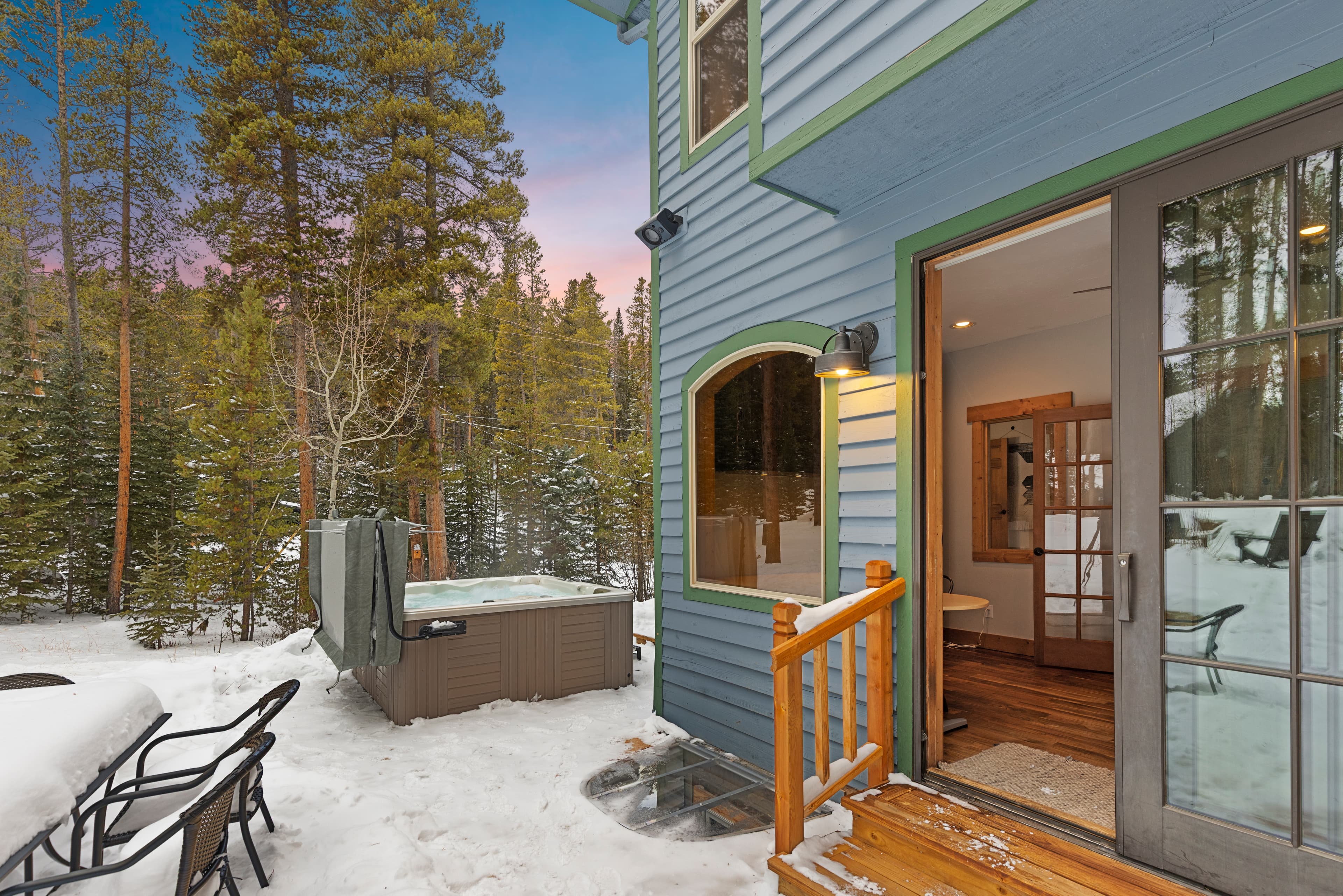 Patio and hot tub in winter snow